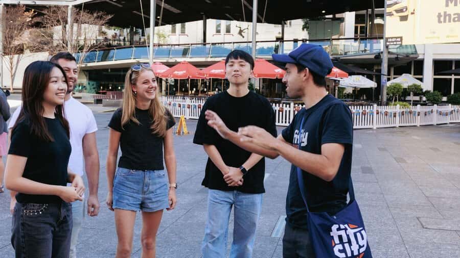 Brisbane: Donuts & Discovery Walking Tour - Big themes: convict beginnings, colonial dramas, floods, and booms