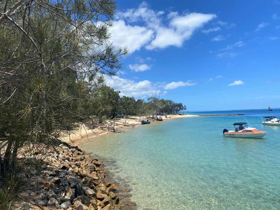 From Brisbane: North Stradbroke Island Wildlife Adventure - Cylinder Beach and Loch Ard Gorge: swimming, limestone views, and that salty air mood